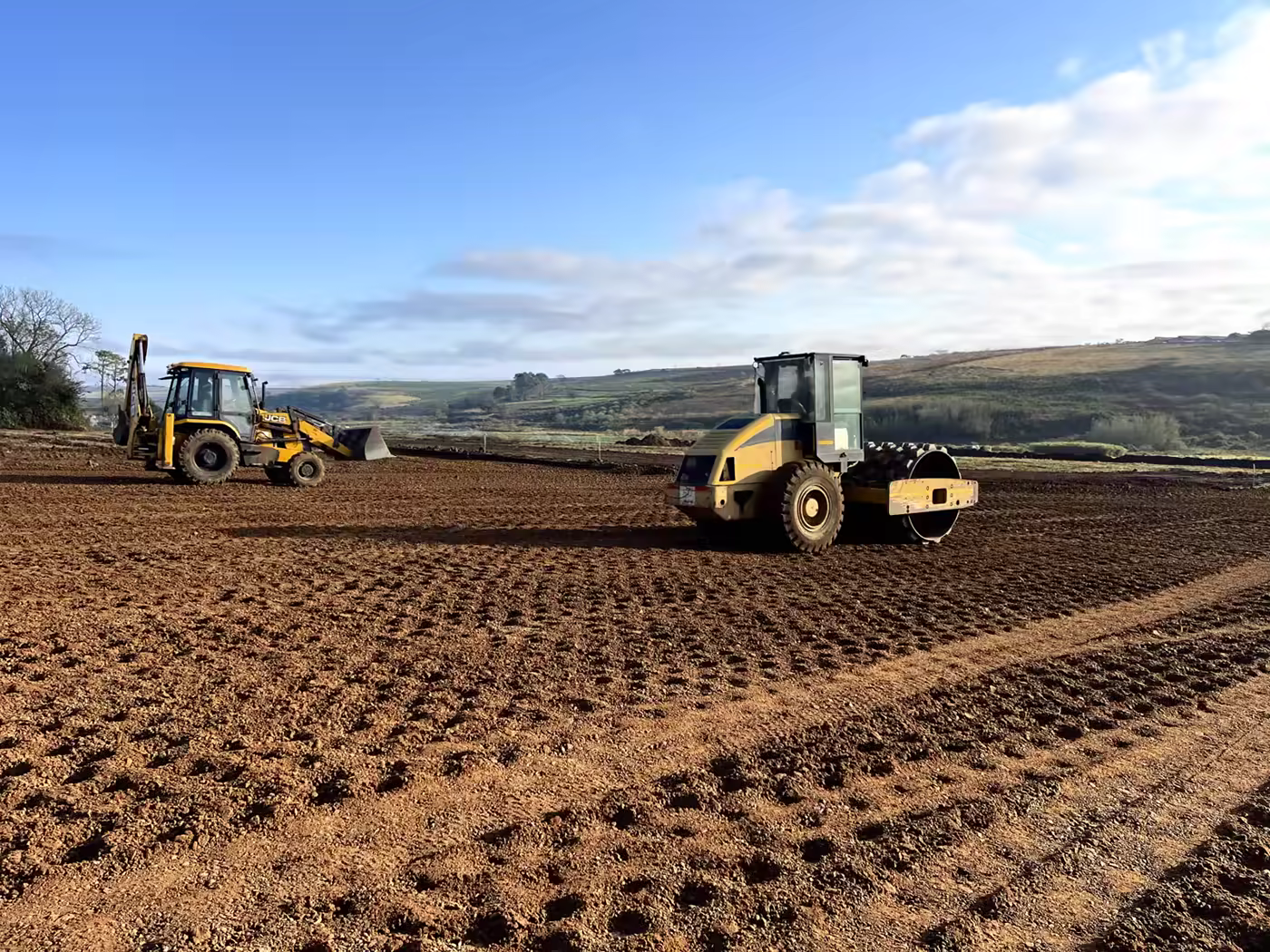 RBW plant hire fleet showing TLB, tipper trucks and earth-moving equipment